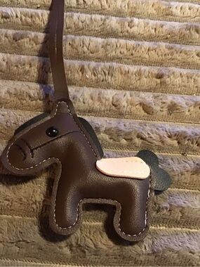 Brown leather Pony with Pink Saddle bag charm